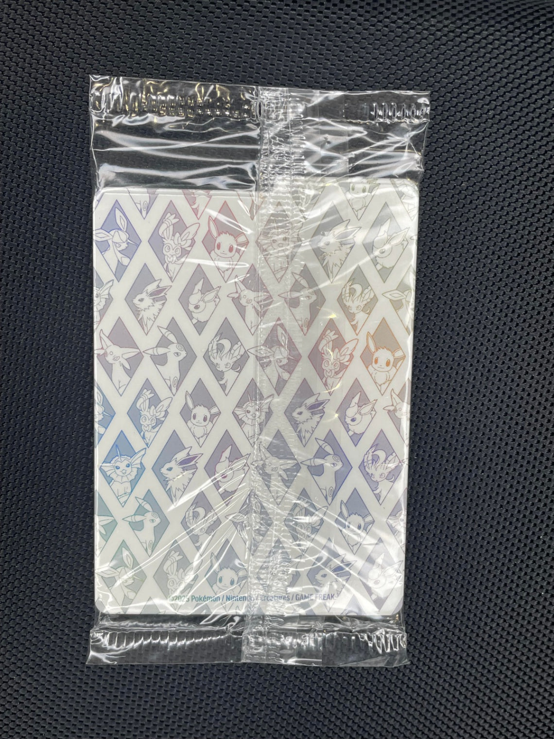 Pokemon Prismatic Evolutions SVP 173 Eevee Promo Sealed TCG NM / M (Back)