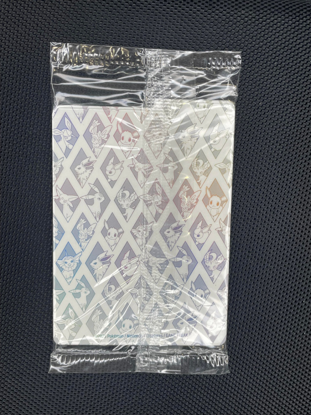 Pokemon Prismatic Evolutions SVP 173 Eevee Promo Sealed TCG NM / M (Back)