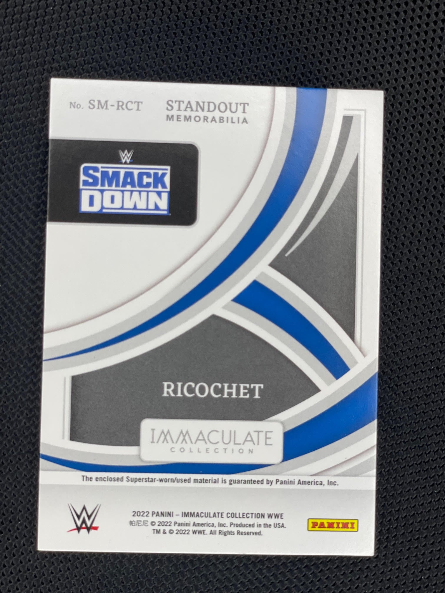2022 Panini Immaculate Collection WWE #SM-RCT Ricochet Standout Memorabilia Gold #/10