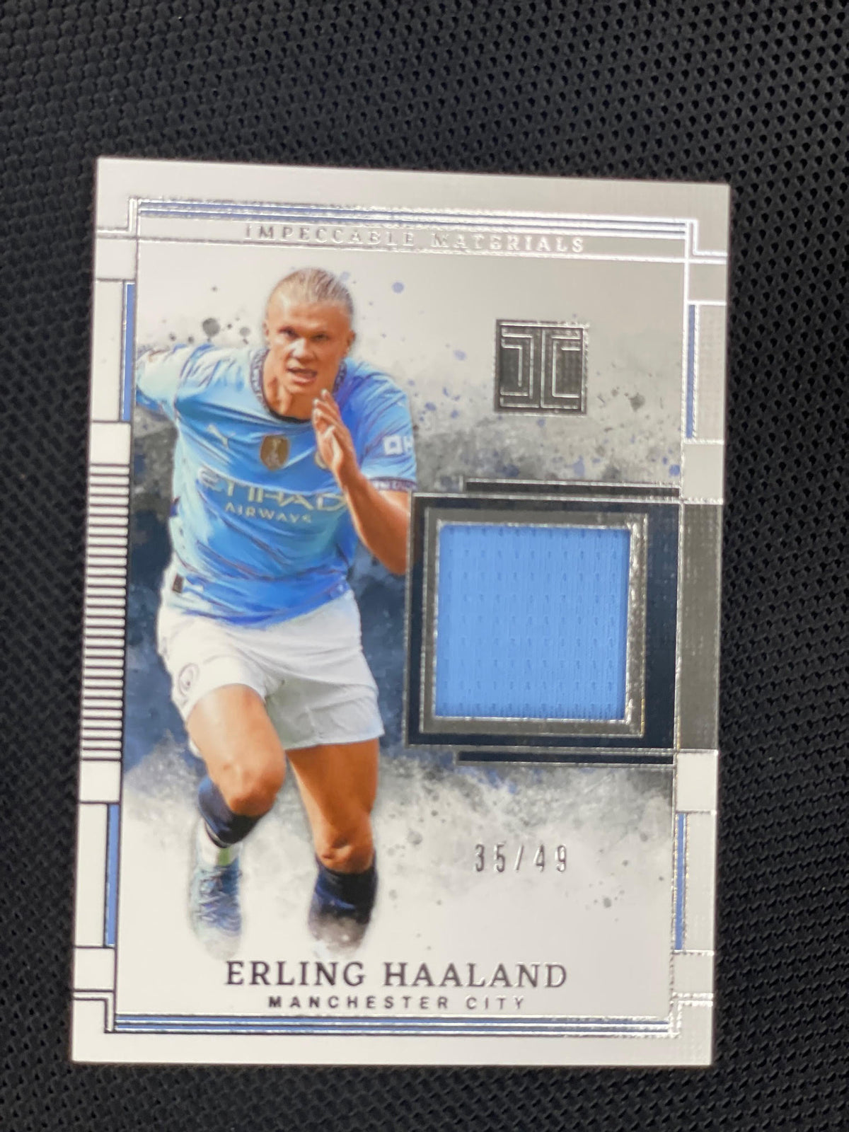 2024-25 Panini Impeccable #MA-EH Erling Haaland Impeccable Materials #/49